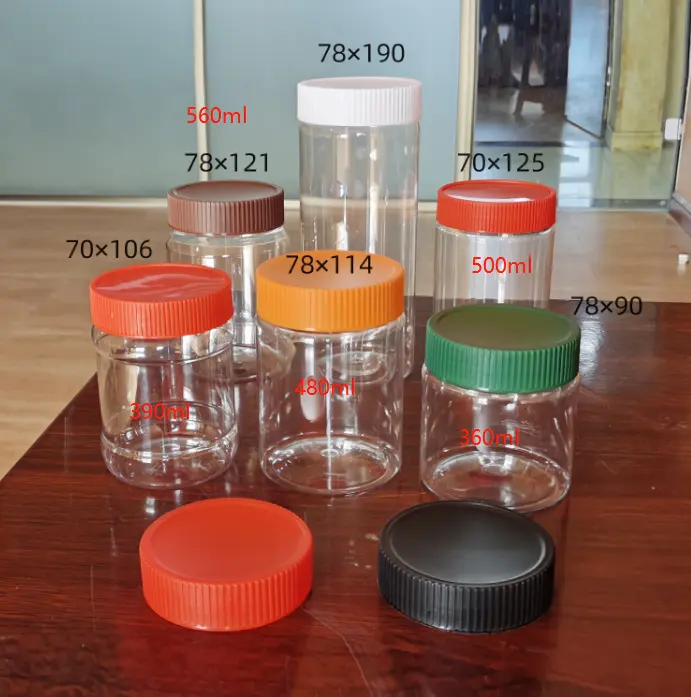 Wholesale Food  Storage Bottle 250 grams 500gr 16oz 12oz Clear pet Containers Peanut Butter Plastic jar with Lids Custom Labels