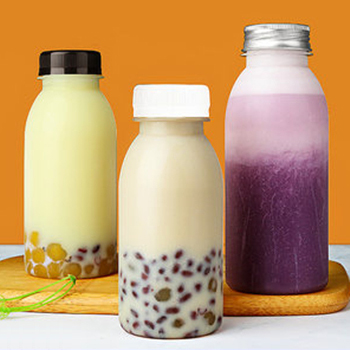 Clear Empty Food Grade PET Plastic Bottles for Juice Filling 12oz 350ml Round Shape Beverage Milk Tea Bottles with Cap